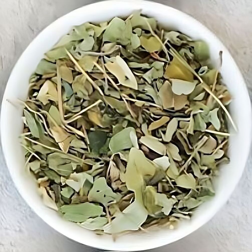 soursop tea leaves in a white bowl